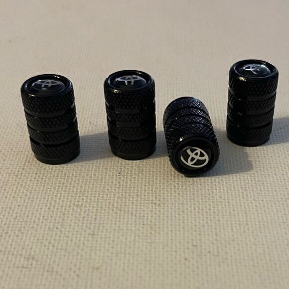Toyota Logo valve Stem caps in black set of 4 NWT - Picture 2 of 4